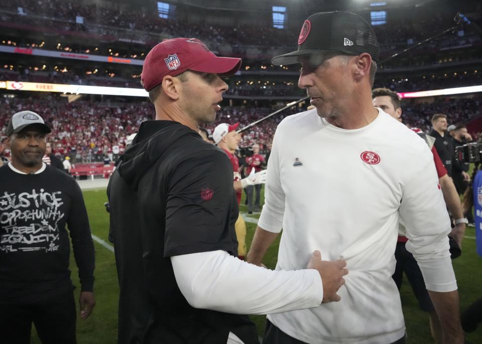 Dec 17, 2023; Glendale, Ariz, United States; Arizona Cardinals head coach Jonathan Gannon shakes hands with San Francisco 49ers head coach Kyle Shanahan after losing 45-22 at State Farm Stadium.