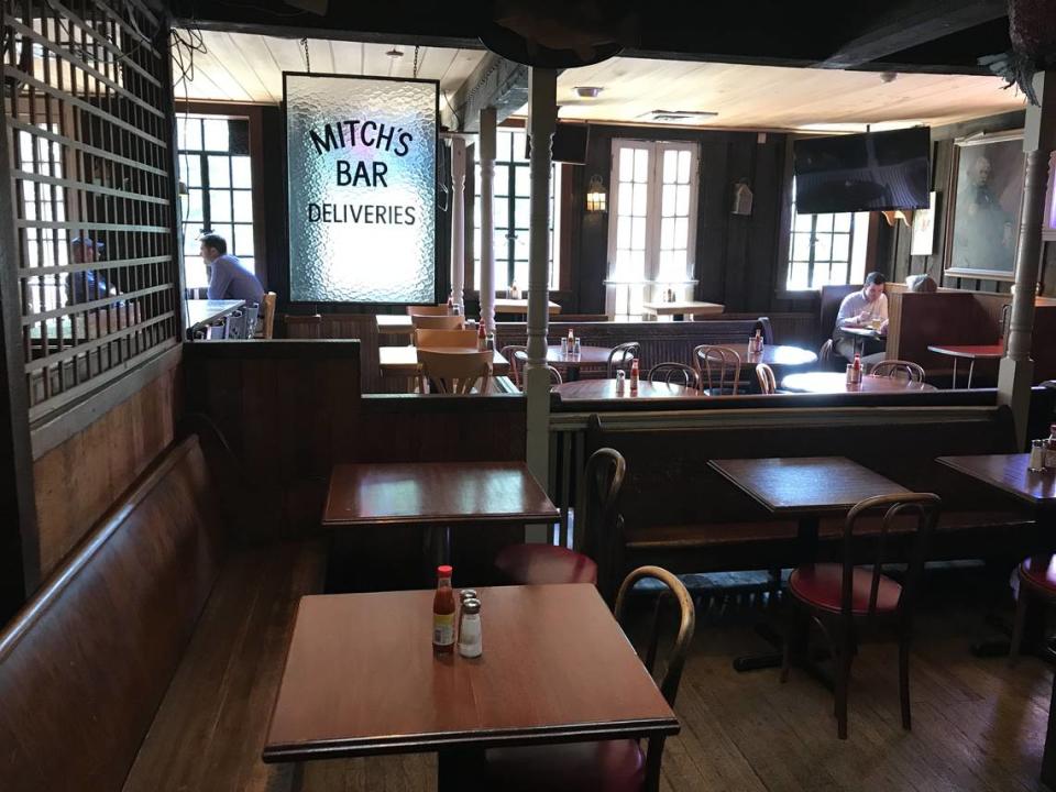 A replica of the window broken by ‘Nuke’ LaLoosh in “Bull Durham” hangs in Mitch’s Tavern, where the scene was filmed, in Raleigh. The local favorite, which has been closed since the start of the pandemic, looks to reopen soon.