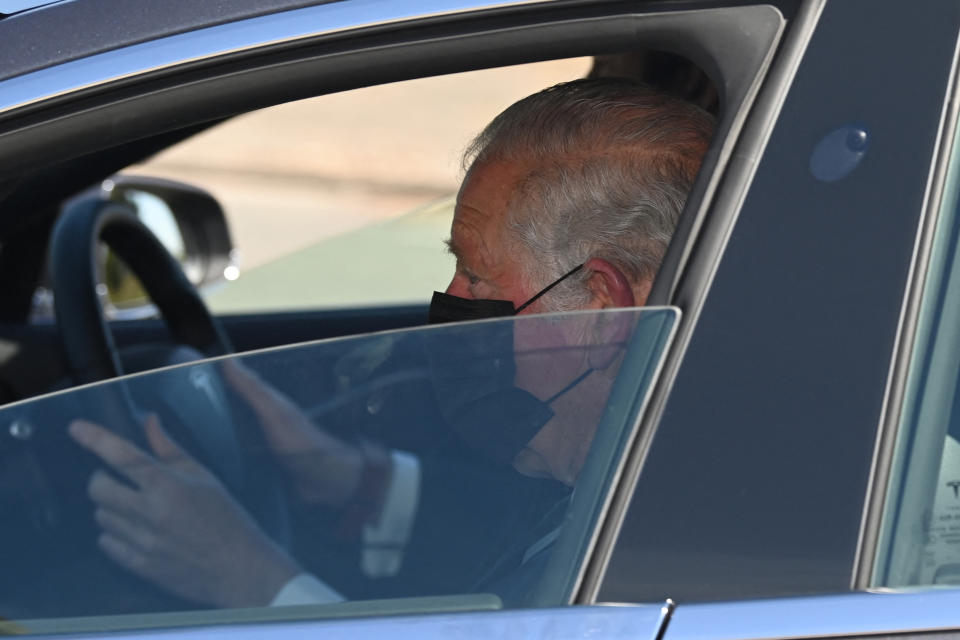 TOPSHOT - Britain's Prince Charles, Prince of Wales arrives to attend the funeral service of his father, Britain's Prince Philip, Duke of Edinburgh, in Windsor Castle in Windsor, west of London, on April 17, 2021. - Philip, who was married to Queen Elizabeth II for 73 years, died on April 9 aged 99 just weeks after a month-long stay in hospital for treatment to a heart condition and an infection. (Photo by Glyn KIRK / AFP) (Photo by GLYN KIRK/AFP via Getty Images)