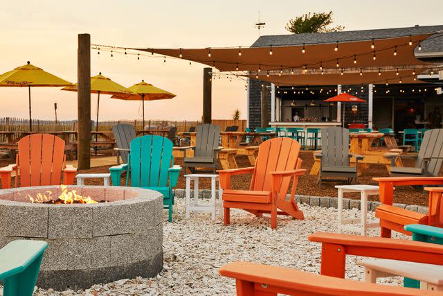 <p>Pat Piasecki</p> With spacious outdoor dining, firepits, and a seafood-forward menu, Sunset Club on Plum Island is a hopping summer spot at sundown