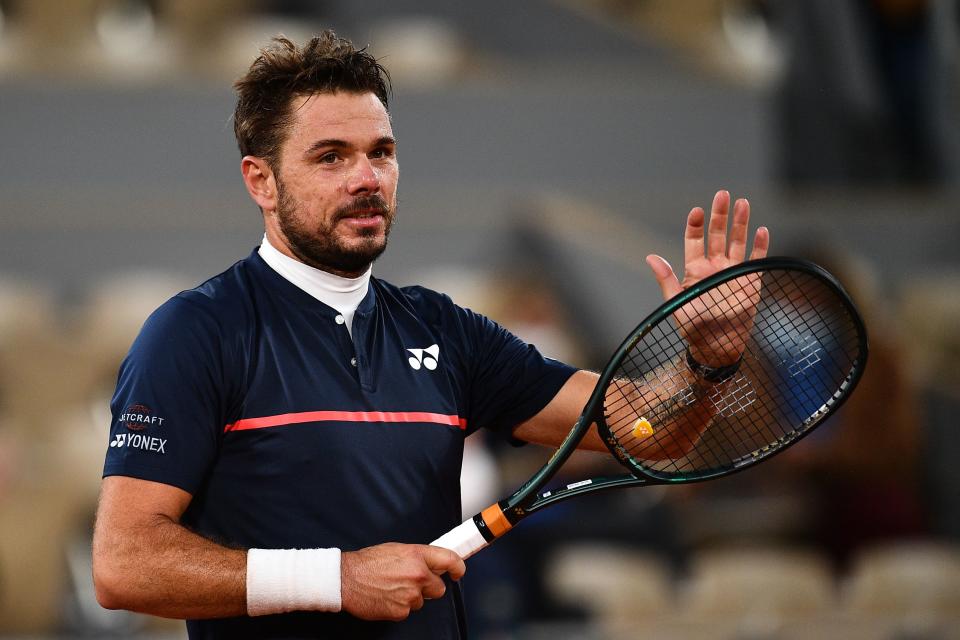 Stanislas Wawrinka celebrates after winning against Britain's Andy Murray during their first round match on Day 1 of The Roland Garros 2020.