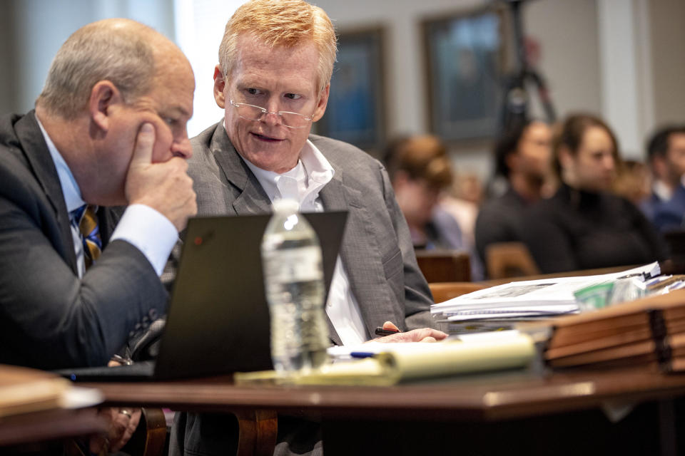 Defense attorney Jim Griffin talks with his client Alex Murdaugh during Murdaugh's double murder trial at the Colleton County Courthouse in Walterboro, South Carolina, Feb. 1, 2023.  / Credit: Andrew J. Whitaker/The Post And Courier via AP, Pool