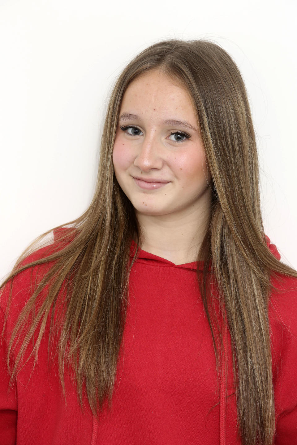 A portrait picture of Ciarra Franco smiling, her in a red jumper. (Getty Images)