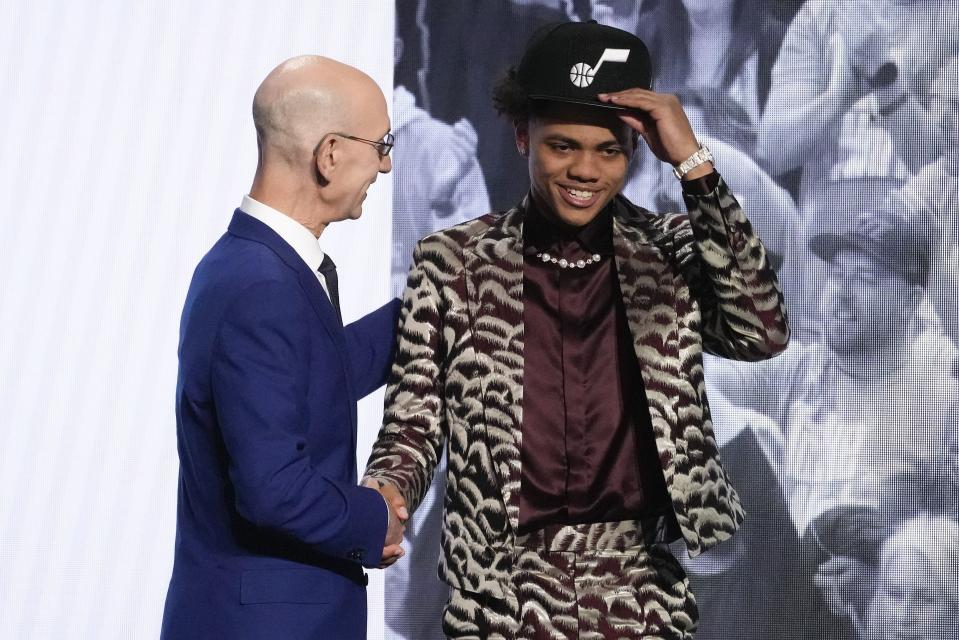 Keyonte George is greeted by NBA commissioner Adam Silver after being selected 16th overall by the Utah Jazz during the NBA draft, Thursday, June 22, 2023, in New York. | John Minchillo, Associated Press