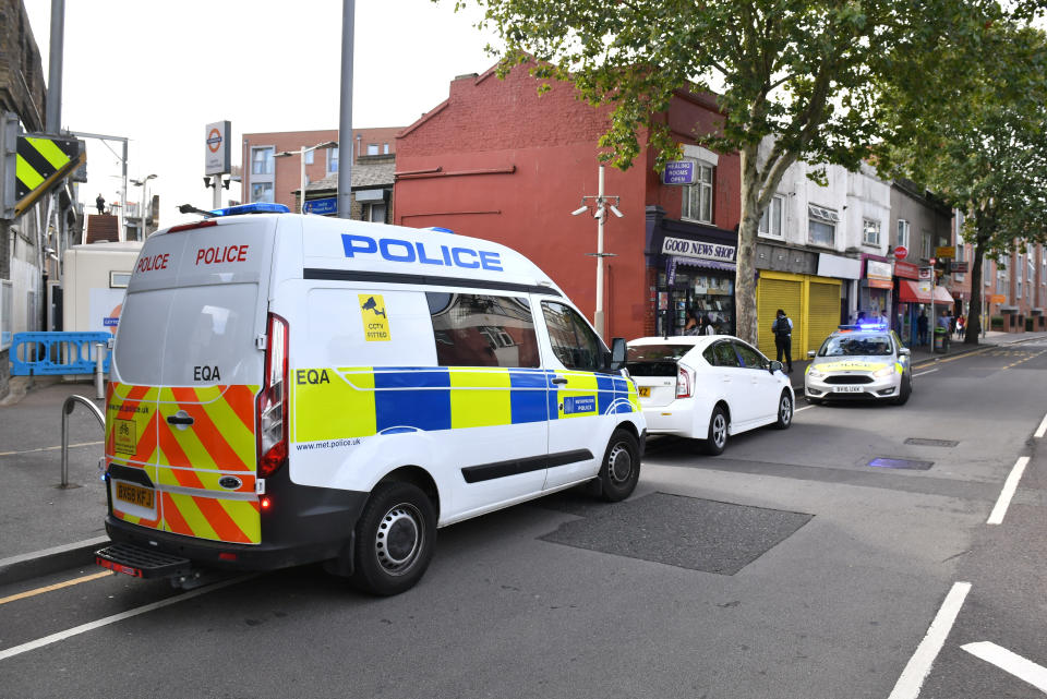 Police officers at the scene in Leyton, east London, where a police officer was stabbed shortly before midnight after attempting to stop a van.