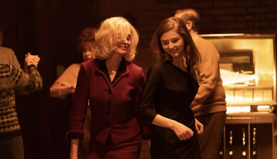 Anne Hathaway and Thomasin McKenzie in Eileen