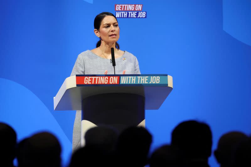 FILE PHOTO: British Home Secretary Priti Patel speaks at the Conservative Party Spring Conference in Blackpool