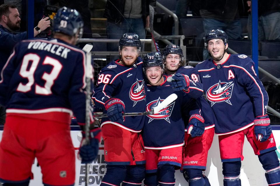 Oct 20, 2022; Columbus, Ohio, USA;  The Columbus Blue Jackets celebrate after defenseman Nick Blankenburg (77) scored the team’s 4th goal during the third period of the hockey game between the Columbus Blue Jackets and the Nashville Predators at Nationwide Arena. Mandatory Credit: Joseph Scheller-The Columbus Dispatch