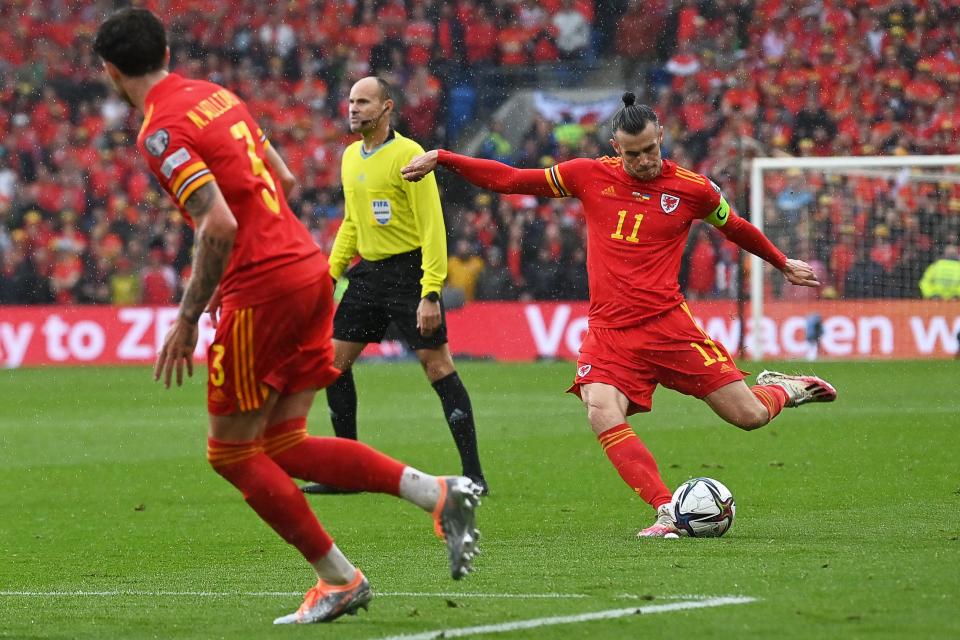 Gareth Bale strikes at goal (AFP via Getty Images)