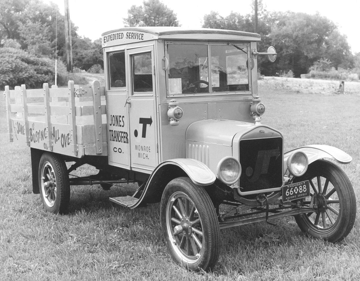 A 1923 Ford Model T used as a one-ton stake bed truck for transporting freight.