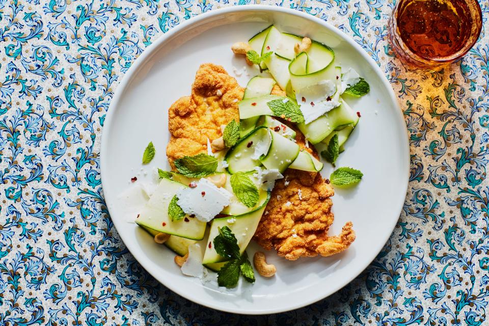 Cornmeal is a naturally gluten-free way to get a crunchy crust on pan-fried chicken cutlets without using breadcrumbs. For a super-summery dinner, serve them with a shaved zucchini salad with mint, cashews, and ricotta salata. <a href="https://www.epicurious.com/recipes/food/views/cornmeal-crusted-chicken-cutlets-with-zucchini-ribbon-salad?mbid=synd_yahoo_rss" rel="nofollow noopener" target="_blank" data-ylk="slk:See recipe." class="link ">See recipe.</a>