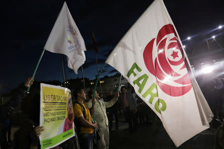 Revolutionary Alternative Force of the Common (FARC) Political party flags are seen during a protest in support of the release of former FARC leader Seuxis Hernandez, known for his war alias Jesus Santrich, in Bogota, Colombia May 15, 2019. REUTERS/Luisa Gonzalez