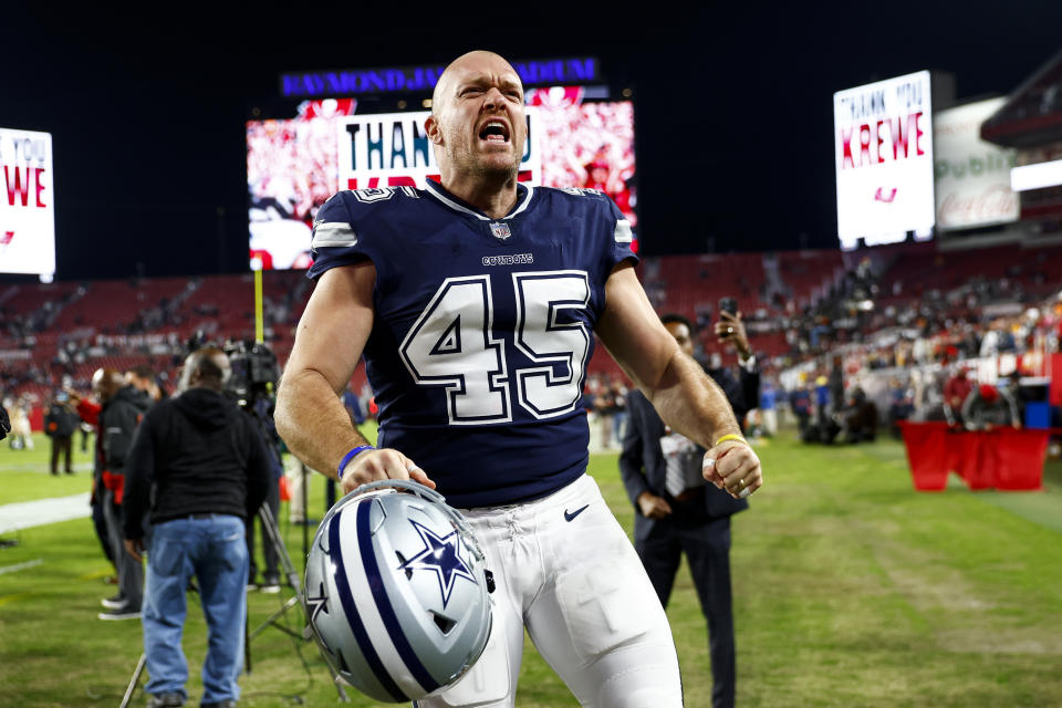 Matt Overton #45 of the Dallas Cowboys celebrates after NFL wild card playoff football win - Credit: Getty Images