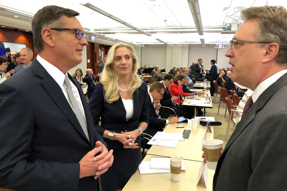 Federal Reserve Governor Lael Brainard (C) speaks with Fed Vice Chair Richard Clarida (L) and New York Fed President John Williams (R) at the Federal Reserve Bank of Chicago in Chicago, Illinois, U.S., June 5, 2019.   REUTERS/Ann Saphir