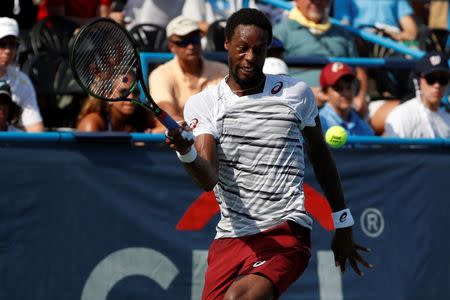 Jul 24, 2016; Washington, DC, USA; Gael Monfils of France hits forehand against Ivo Karlovic of Croatia (not pictured) in the men's singles final of the Citi Open at Rock Creek Park Tennis Center. Monfils won 5-7, 7-6(6), 6-4. Mandatory Credit: Geoff Burke-USA TODAY Sports