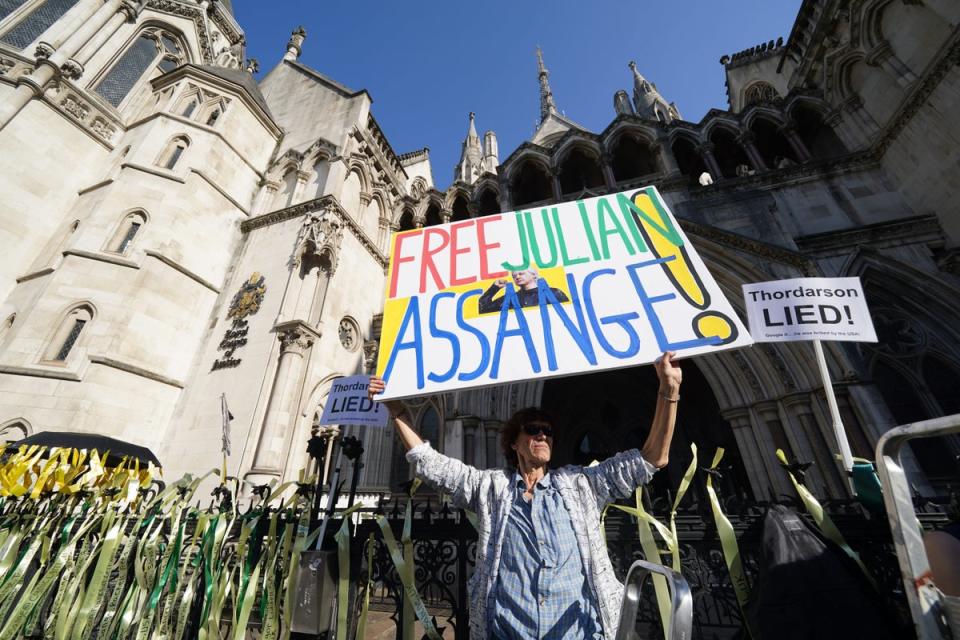 Supporters of Julian Assange outside the Royal Courts of Justice in London, ahead of the latest stage of his US extradition legal battle (Lucy North/PA) (PA Wire)