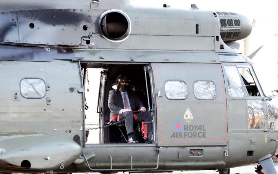 Boris Johnson leaves London this morning in a RAF Helicopter with a security detail. - Nigel Howard
