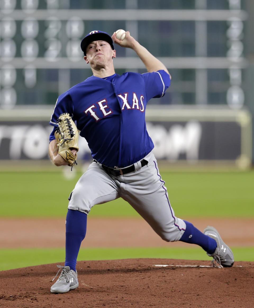 Texas Rangers starting pitcher Kolby Allard throws against the Houston Astros during the first inning of a baseball game Wednesday, Sept. 18, 2019, in Houston. (AP Photo/Michael Wyke)