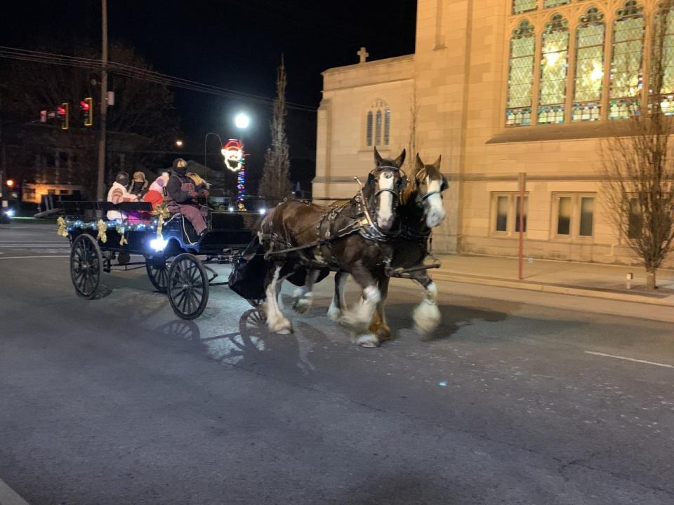 Visitors can take carriage rides through downtown Zanesville during the holiday season.