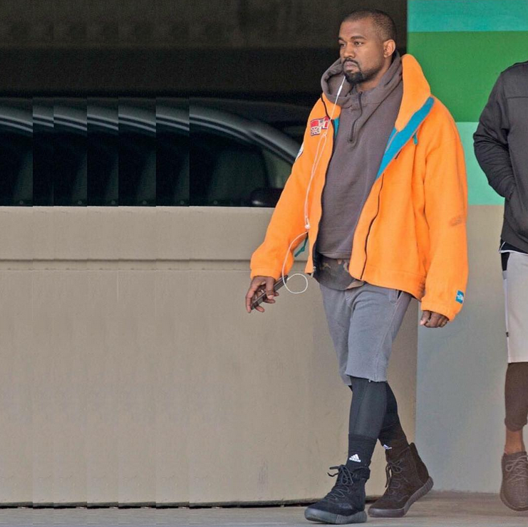 Kanye West wearing Yeezy Boost 750s without a strap.