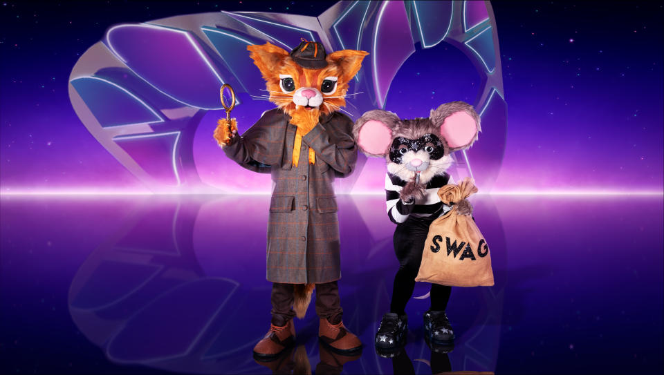 This image and the information contained herein is strictly embargoed until 20.00 Sunday 18th December 2022

From Bandicoot TV

The Masked Singer: SR4 on ITV1 and ITVX

Pictured: Cat & Mouse.

This photograph is (C) ITV Plc/Bandicoot TV and can only be reproduced for editorial purposes directly in connection with the programme or event mentioned above, or ITV plc. Once made available by ITV plc Picture Desk, this photograph can be reproduced once only up until the transmission [TX] date and no reproduction fee will be charged. Any subsequent usage may incur a fee. This photograph must not be manipulated [excluding basic cropping] in a manner which alters the visual appearance of the person photographed deemed detrimental or inappropriate by ITV plc Picture Desk.  This photograph must not be syndicated to any other company, publication or website, or permanently archived, without the express written permission of ITV Picture Desk. Full Terms and conditions are available on the website www.itv.com/presscentre/itvpictures/terms

For further information please contact:
james.hilder@itv.com