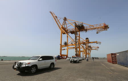 FILE PHOTO: A convoy of vehicles transporting U.N. envoy to Yemen Martin Griffiths drive during a visit to the Red Sea port of Hodeidah, Yemen November 23, 2018. Picture taken November 23, 2018. REUTERS/Abduljabbar Zeyad