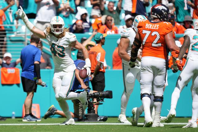 Jevon Holland's forced fumbles, Emmanuel Ogbah pick-six show Dolphins can  be 'complete team