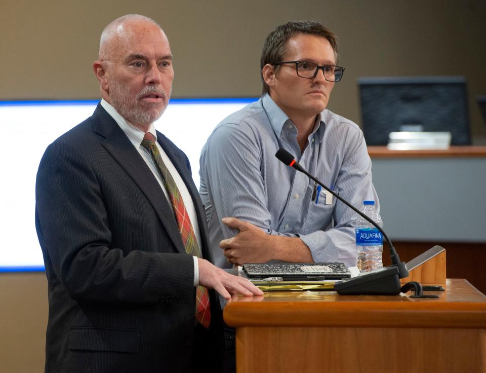 Adams Sanitation representatives George Mead and Nathan Boyles appear before the Santa Rosa County Commission on Sept. 22 to plead the company's case for expansion into southern Santa Rosa County.