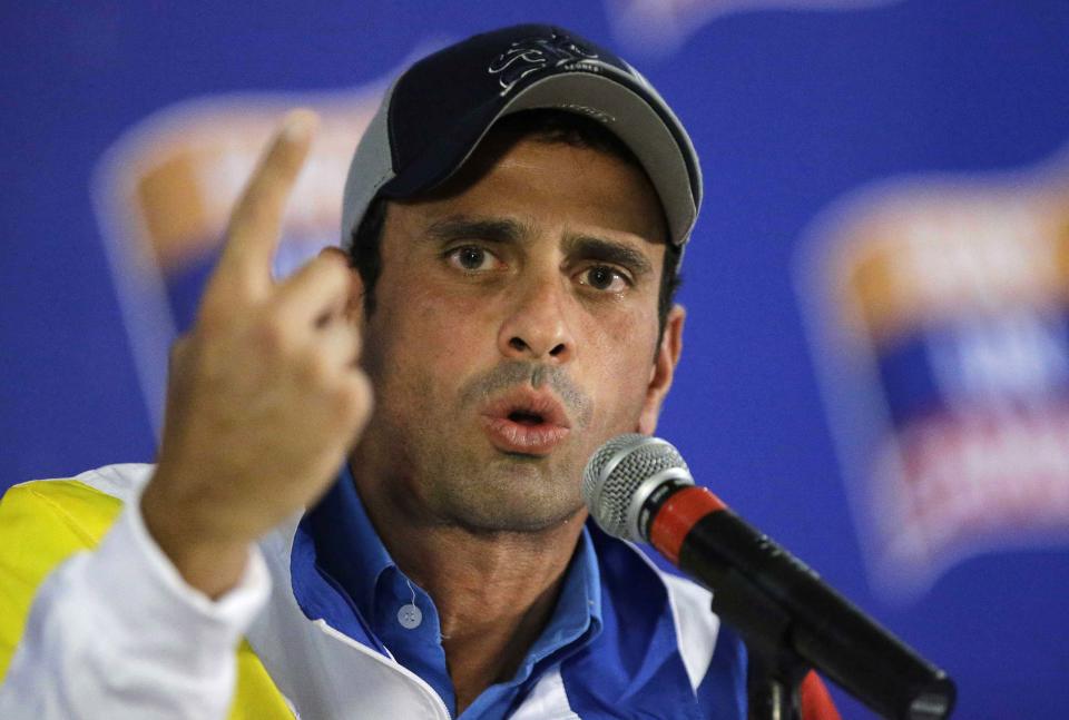 Former opposition presidential candidate Henrique Capriles speaks during a news conference in Caracas, Venezuela, Tuesday, Oct. 9, 2012. Capriles defended a parking lot-sized goal on the downhill half while President Hugo Chavez's team manned a pixie goal on the uphill side. (AP Photo/Fernando Llano)