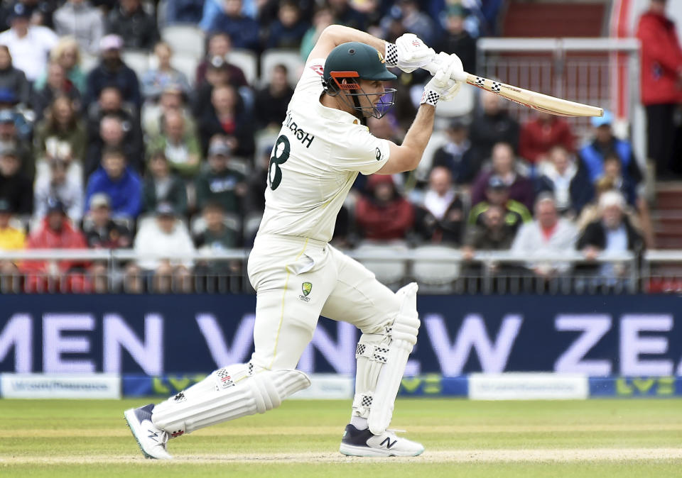 Australia's Mitchell Marsh plays a shot during the fourth day of the fourth Ashes Test match between England and Australia at Old Trafford, Manchester, England, Saturday, July 22, 2023. (AP Photo/Rui Vieira)