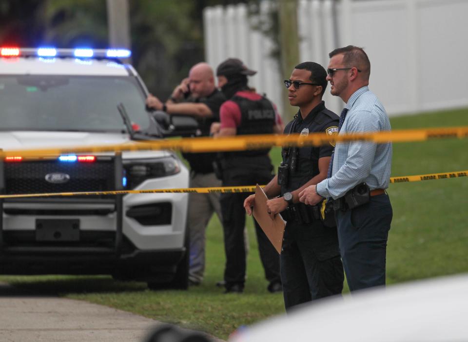 Port St. Lucie Police and crime scene investigators examine the scene of gunfire at a house in the 200 Block of Southwest Ridgecrest Drive on Thursday, Jan. 18, 2024.