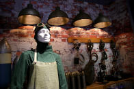 <p>Elena Anaya’s costume as the villainous Dr. Maru along with props from her lab. (Photo: Jacob Kramer/Yahoo Movies) </p>