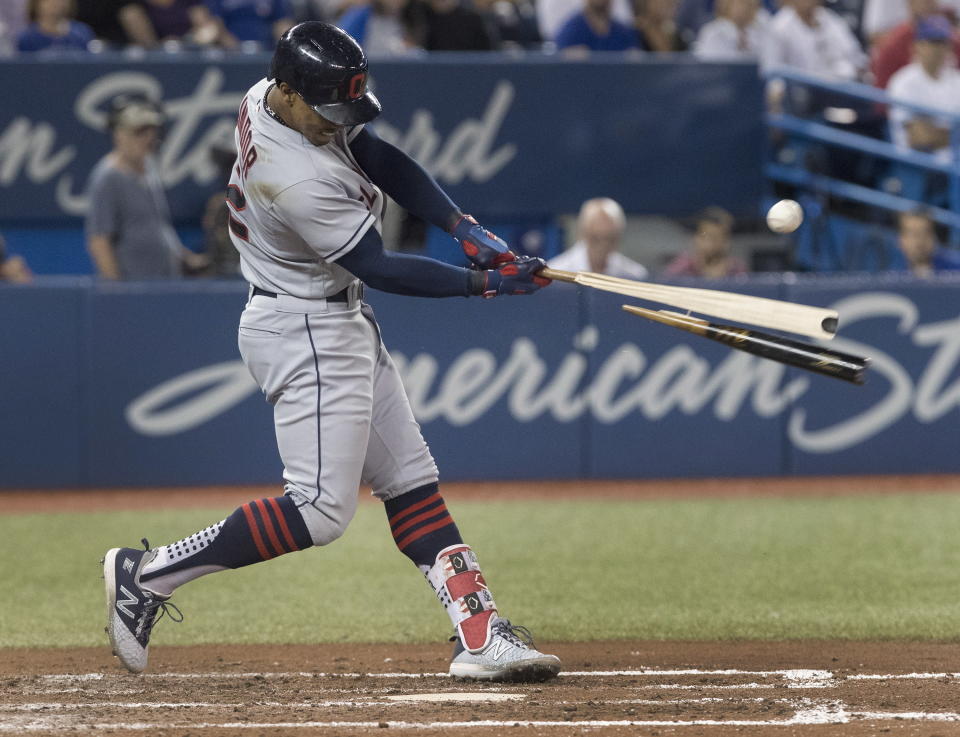 Cleveland Indians' Francisco Lindor hits a broken-bat single to drive in two runs against the Toronto Blue Jays during the fifth inning of a baseball game Thursday, Sept. 6, 2018, in Toronto. (Fred Thornhill/The Canadian Press via AP)