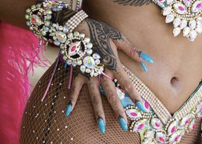 A closeup of Rihanna’s hand in the photo that she posted from carnival. (Photo: Rihanna via Instagram)