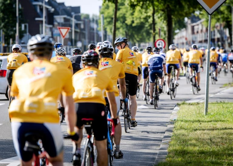 Cyclists, approximately 13,000 participants, explore the course for the 102nd edition of the Tour de France in Utrecht, which starts on July 4, 2015 in soaring temperatures