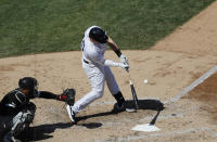 New York Yankees pinch hitter Luke Voit (45) hits an RBI single during the seventh inning of a baseball game against the Chicago White Sox, Saturday, April 13, 2019, in New York. (AP Photo/Kathy Willens)