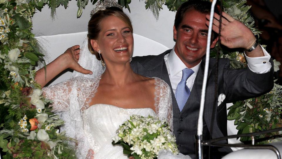 Princess Nikolaos of Greece and Princess Tatiana leave in a horse drawn carriage after getting married at the Cathedral of Ayios Nikolaos (St. Nicholas) on August 25, 2010