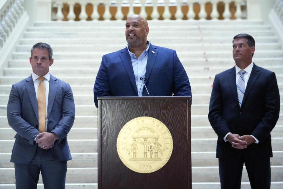 FILE - Former U.S. Capitol police officer Harry Dunn speaks as former Rep. Adam Kinzinger, left, and former Georgia Lt. Gov. Geoff Duncan listen. during a news conference at the Georgia State Capitol ahead of the Presidential Debate Wednesday, June 26, 2024, in Atlanta. (AP Photo/John Bazemore, File)