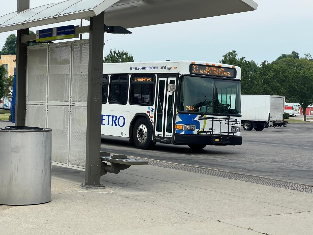 A Metro bus pulls into the Glenway Crossing Transit Center in Cincinnati's Westwood neighborhood.