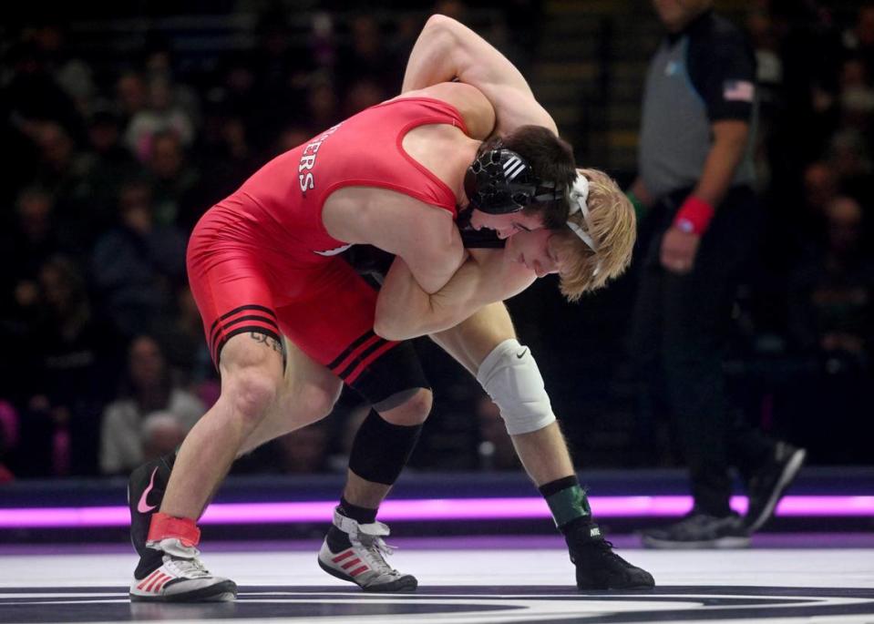 Penn State’s Braeden Davis wrestles Rutgers’ Dean Peterson in the 125 lb bout of the match on Monday, February. 12, 2024 at the Bryce Jordan Center.