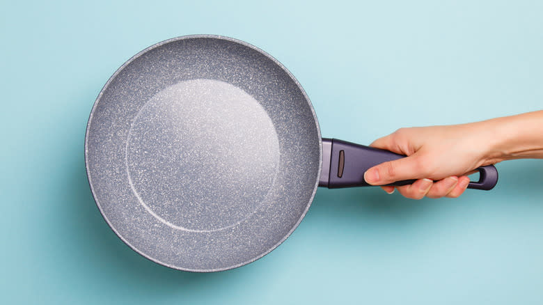 Holding non-stick pan