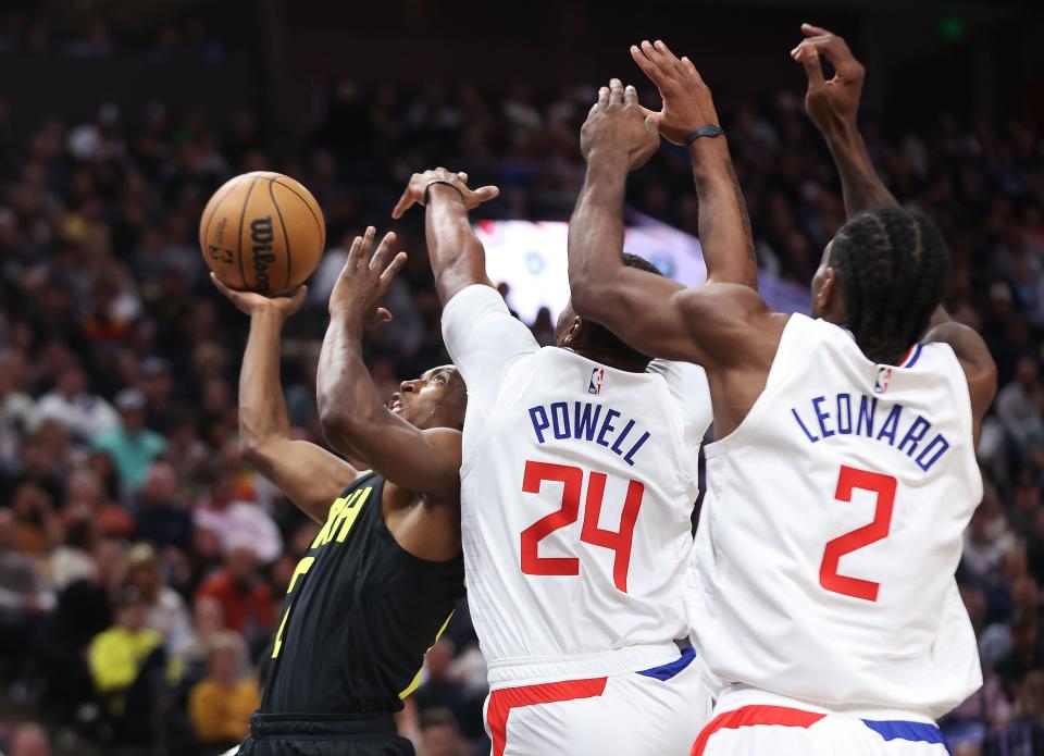 Utah Jazz guard Collin Sexton (2) drives by LA Clippers guard Norman Powell (24) in Salt Lake City on Friday, Oct. 27, 2023. The Jazz won 120-118. | Jeffrey D. Allred, Deseret News