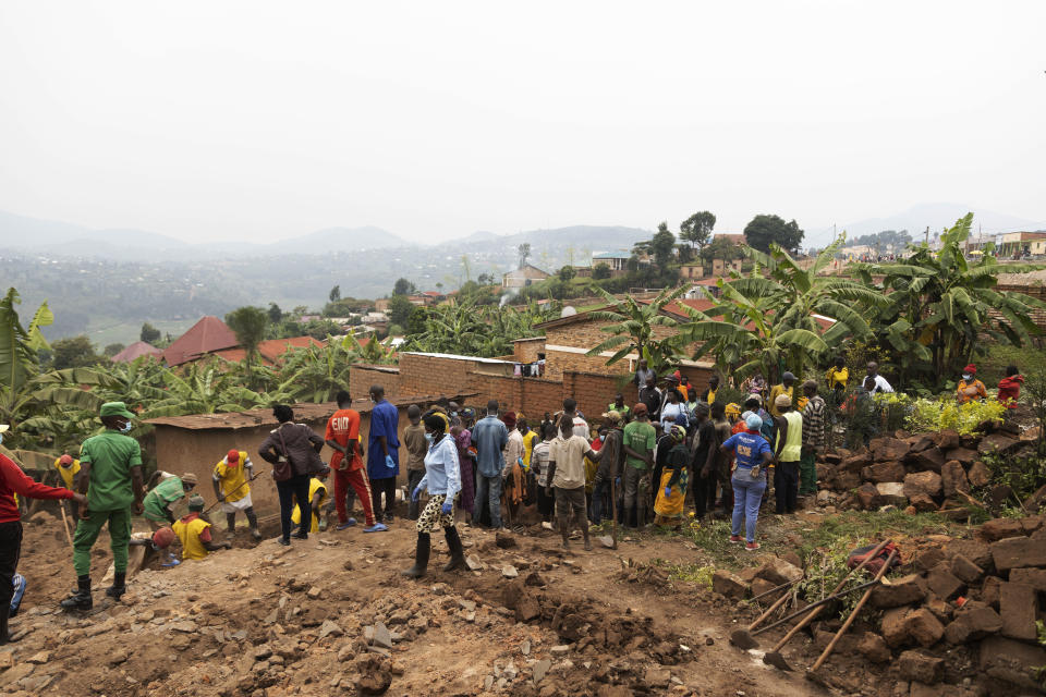 Remains of victims are retrieved from a site, in Huye District, southern Rwanda Tuesday, Jan. 23, 2024. A Rwandan official says the remains of 119 people believed to be victims of genocide have been discovered in the country’s south, as authorities continue to find mass graves nearly three decades after the killings. In April, Rwanda will commemorate the 30th anniversary of the genocide, in which an estimated 800,000 Tutsi and moderate Hutu were killed by Hutu extremists. (AP Photo)