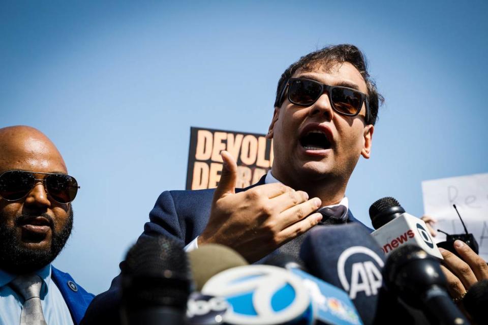 U.S. Rep. George Santos, R-N.Y., speaks to the media outside the federal courthouse in Central Islip, N.Y., Wednesday May 10, 2023. Santos, the New York Republican infamous for fabricating his life story, pleaded not guilty Wednesday to charges he duped donors, stole from his campaign and lied to Congress about being a millionaire, all while cheating to collect unemployment benefits he didn’t deserve. Afterward, he said wouldn’t drop his reelection bid, defying calls to resign. (AP Photo/Stefan Jeremiah)