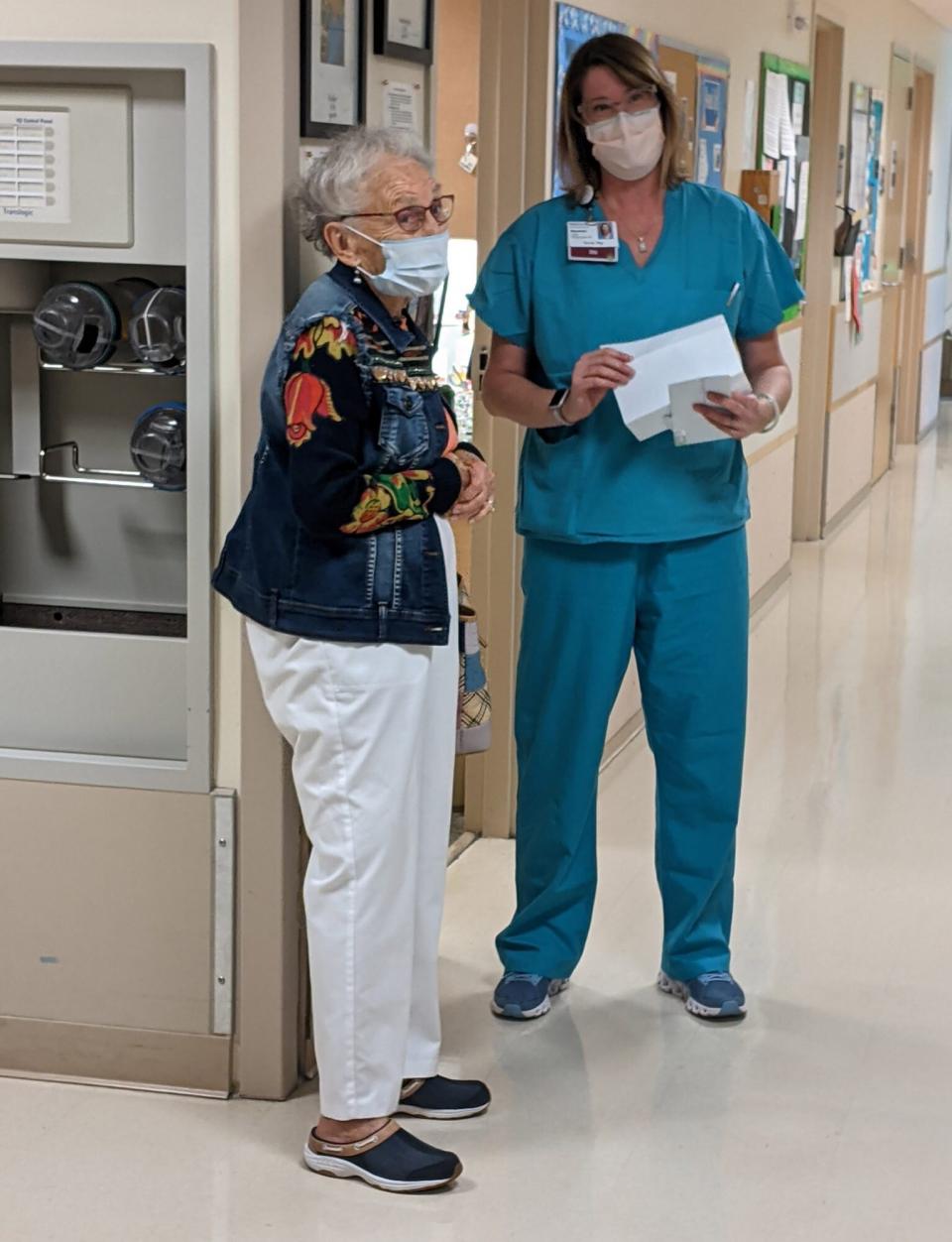 Florence "SeeSee" Rigney says good bye to staff at MultiCare Tacoma General Hospital on her last day.