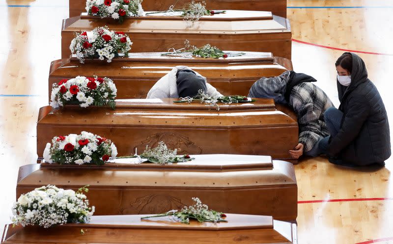 Mourners attend a lying-in-state for victims who died in a migrant shipwreck, in Crotone