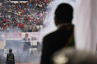 <p>Smoke rises from cannon as the military regiment makes a 21-gun salute during the inauguration of Zimbabwe’s new President Emmerson Mnangagwa (R) on Nov. 24, 2017. (Photo: Zinyange AuntonyAFP/Getty Images) </p>