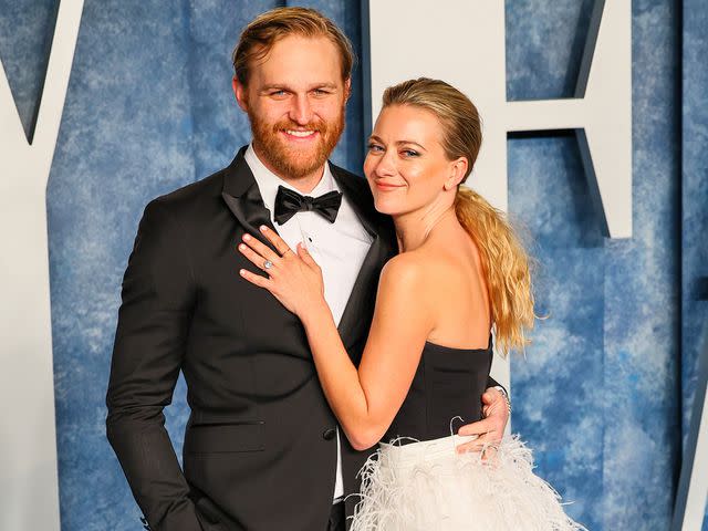 <p>Leon Bennett/FilmMagic</p> Wyatt Russell and Meredith Hagner attend the 2023 Vanity Fair Oscar Party on March 12, 2023 in Beverly Hills, California.