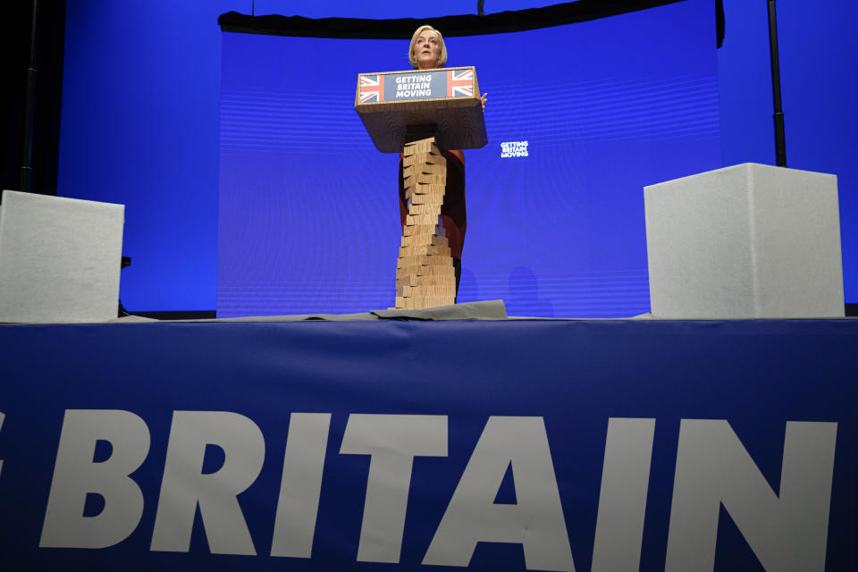 Britain's Prime Minister Liz Truss makes a speech at the Conservative Party conference at the ICC in Birmingham, England, Wednesday, Oct. 5, 2022. (AP Photo/Kirsty Wigglesworth)