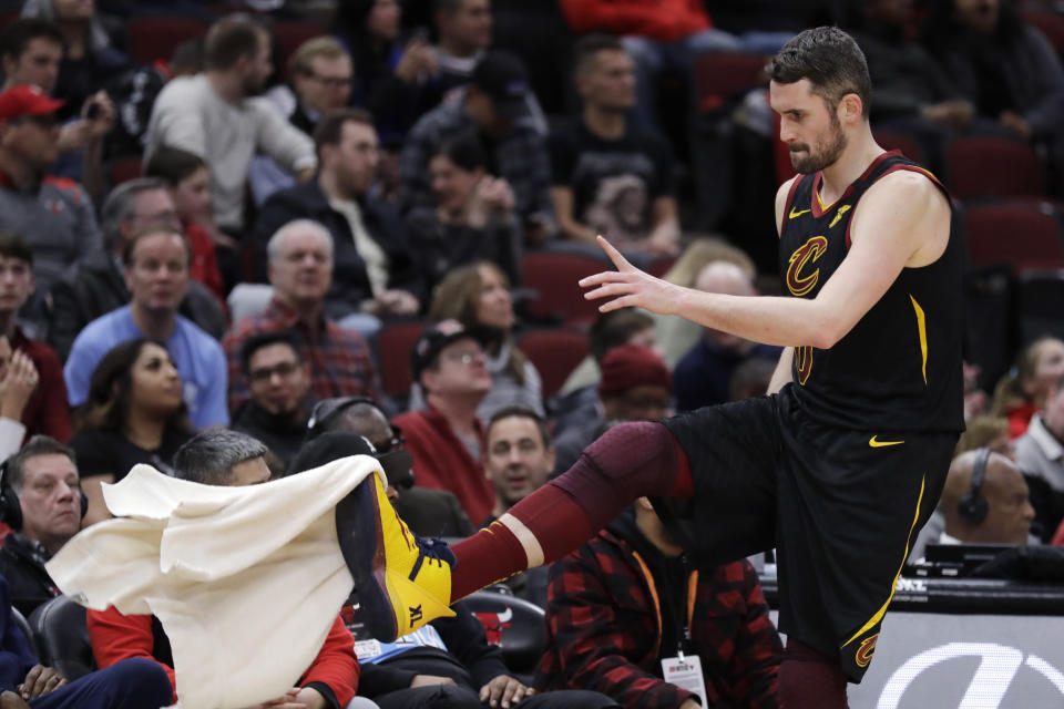 Cleveland Cavaliers forward Kevin Love kicks a towel as he walks back to the bench during the second half of the team's NBA basketball game against the Chicago Bulls in Chicago, Saturday, Jan. 18, 2020. (AP Photo/Nam Y. Huh)